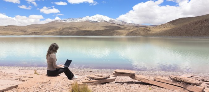 Digital Nomad woman-working-by-the-water-crop