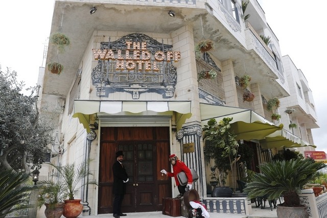 banksy walled off hotel exteriors